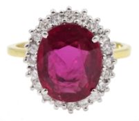 18ct gold oval ruby and round brilliant cut diamond cluster ring