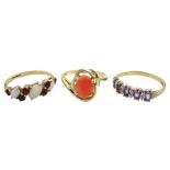 Gold single stone coral ring