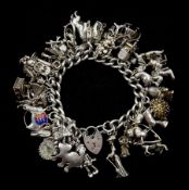 Heavy silver charm bracelet