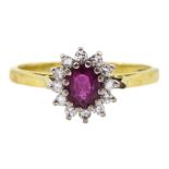 18ct gold oval ruby and round brilliant cut diamond cluster ring