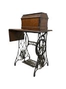 Singer sewing machine with cast iron treadle base