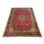 Large Persian Mashad red ground with all over floral field centred by lozenge medallion 377 x 277