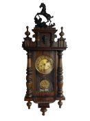 A German spring driven wall clock c1900 in a compact mahogany veneered Vienna style case
