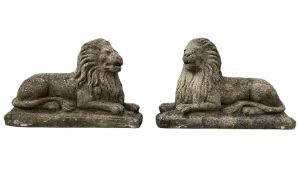 Pair of composite stone garden lions