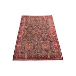Handknotted Persian rug from Sanandaj region with five red medallions