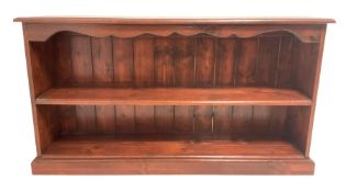 Stained pine low bookcase