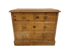 Pine chest fitted with two short and two long drawers