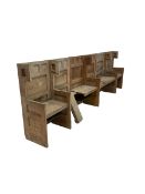 Sectional set of oak priory pews with six hinged and lifting seats