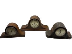 Three 1930s mantle clocks in oak tambour cases. Two with Westminster chime on the quarters and one s