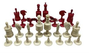 Early 20th century stained and natural bone chess pieces