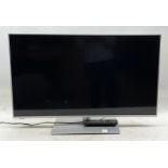 Panasonic TX-L39E6B 39" LCD TV with remote and a panasonic SC-HC3DB stereo