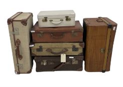An assortment of suitcases of various proportions together with one steamer trunk (6)