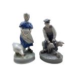Royal Copenhagen porcelain figure 'Goose Girl' no. 527 and 'Farmer with Sheep' no. 627 both designed