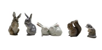 Five Royal Copenhagen porcelain figures comprising an Otter no. 2333 designed by Vilhelm Waldorff