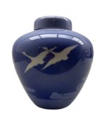 Royal Copenhagen porcelain ginger jar and cover decorated with geese flying over clouds