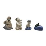 Four Royal Copenhagen porcelain figures comprising a Mermaid holding a Fish no. 2348