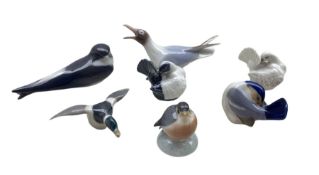 Six Royal Copenhagen birds comprising two Pigeons no. 4787 designed by Jeanne Grut