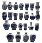 Twenty-four Royal Copenhagen 'Rundskuedag' porcelain vases dated 1913