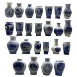 Twenty-four Royal Copenhagen 'Rundskuedag' porcelain vases dated 1913