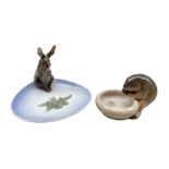 Royal Copenhagen porcelain ashtray surmounted with a Rabbit no. 878 designed by Christian Thomsen an