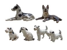 Four Bing & Grondahl porcelain dogs comprising a Great Dane no. 2190