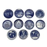 Eleven Royal Copenhagen Christmas plates comprising years 1920 - 1923