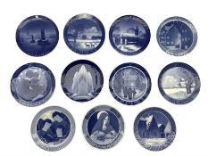 Eleven Royal Copenhagen Christmas plates comprising years 1920 - 1923