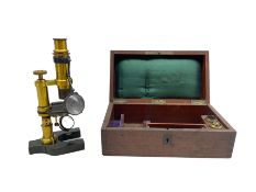 Black and lacquered brass microscope in mahogany box L28cm