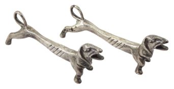 Pair of silver dachshund knife rests Sheffield 1967 Maker James Dixon & Sons