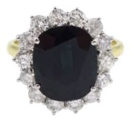 18ct gold oval sapphire and round brilliant cut diamond cluster ring