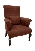 Edwardian armchair upholstered in later fabric