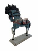 Large painted cast metal model of a horse