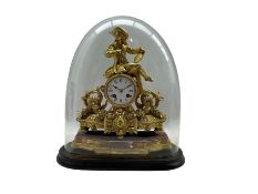 A French gilt spelter striking mantle clock housed under a glass dome c 1880