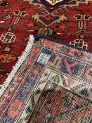 Kashan runner rug with red field and all over geometric design