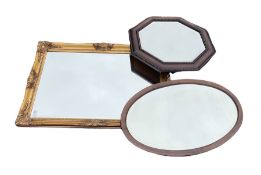 Collection of three mirrors of different styles and sizes