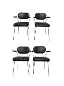 Set of four leather and metal chairs