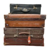 Four vintage suitcases