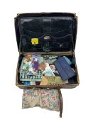 Small leather suitcase and contents of sewing items