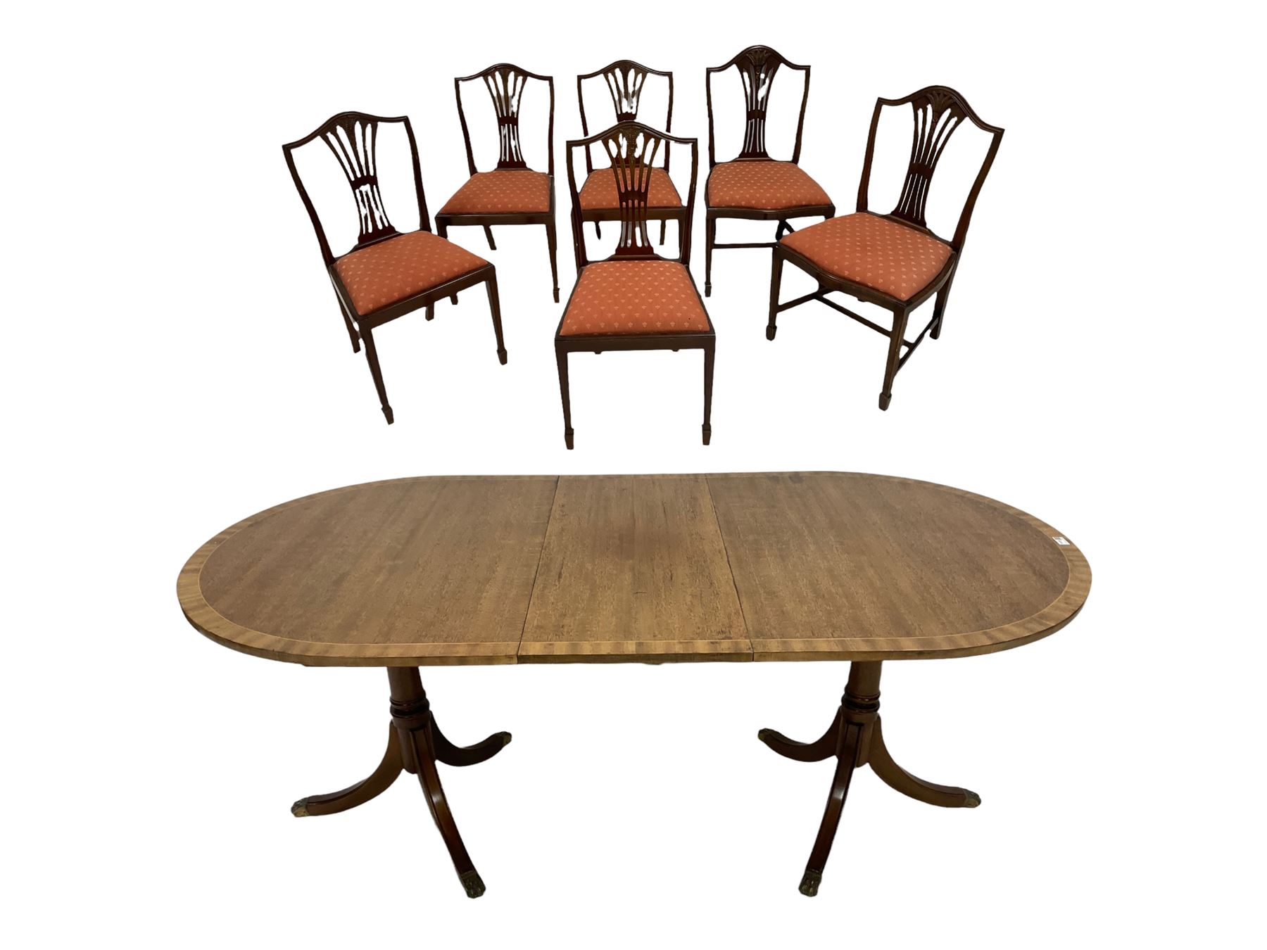 20th century mahogany regency design twin pillar dining table together with a set of six dining chai