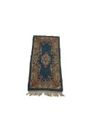 Chinese washed woollen rug 135cm x 59cm