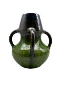 Art Nouveau green glazed vase with four tendril handles