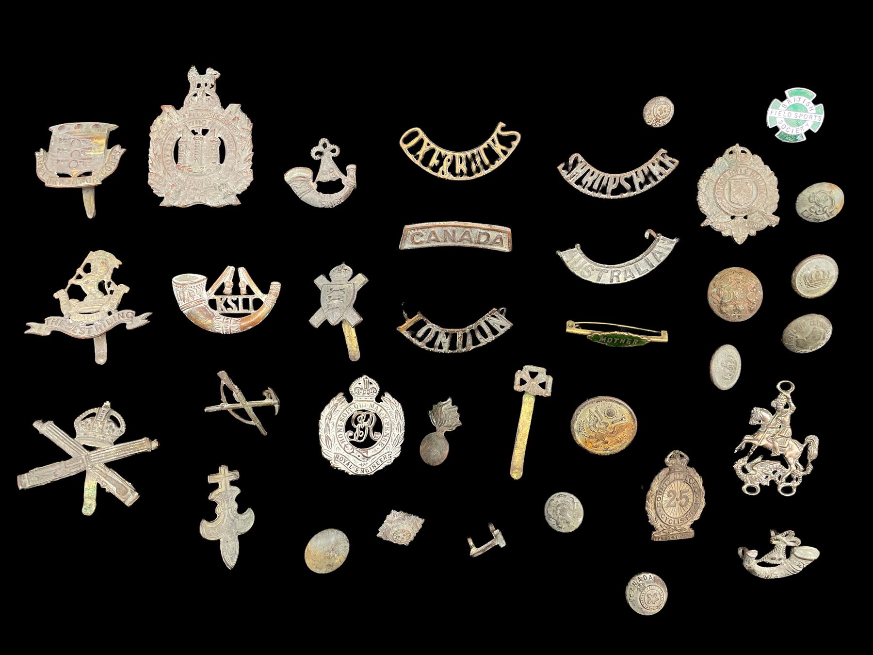 Military cap badges and buttons including Royal Engineers