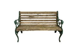 Garden bench with green decorative cast iron ends and slat seat and back