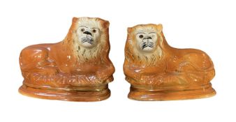 Pair of Staffordshire type lions