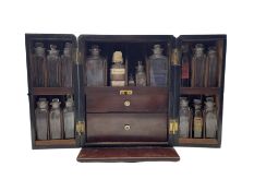 Early 19th century mahogany apothecaries cabinet enclosed by pair of divided front doors