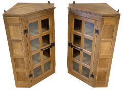 'Rabbitman' pair panelled oak wall hanging corner cabinets