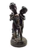 20th century bronze group of a young girl and boy