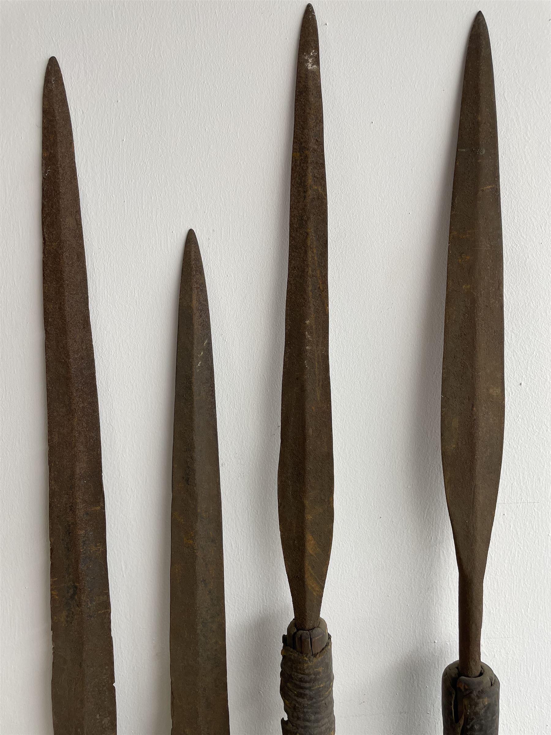 Nine African Zulu spears and a pair of wooden paddle clubs with hatch carved decoration L151cm (11) - Image 6 of 8