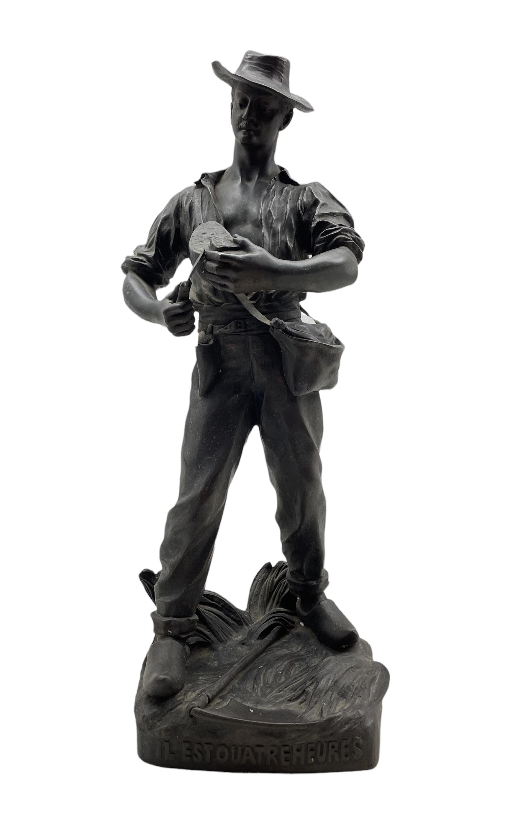 Henri Fugere (French 1872-1944) Bronze figure of a farm labourer cutting bread 'Il Est Quatre Heures