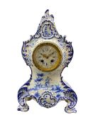 French Faience porcelain mantle clock with blue and white decoration c1890